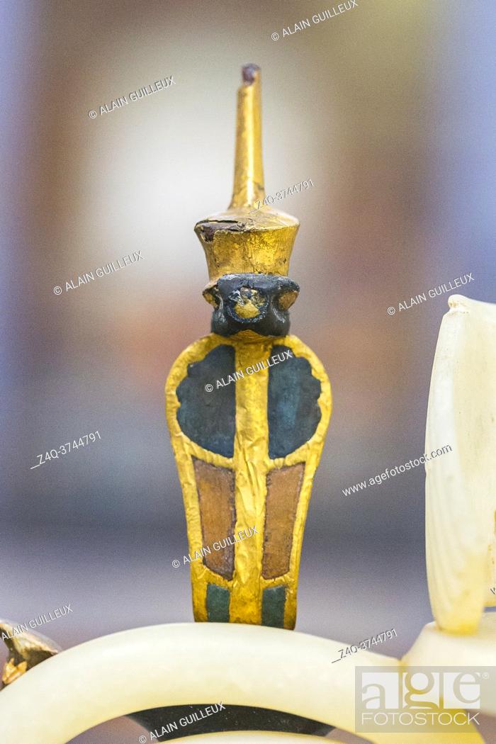 Stock Photo: Egypt, Cairo, Egyptian Museum, Tutankhamon alabaster, from his tomb in Luxor : Detail of a composite perfume vase, a cobra wearing the red crown.