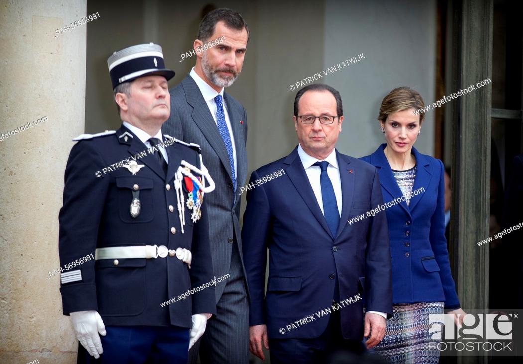 Stock Photo: French President Francois Hollande, Spanish King Felipe and Queen Letizia attend a statement in front of the Elysee palace after a meeting with the French.