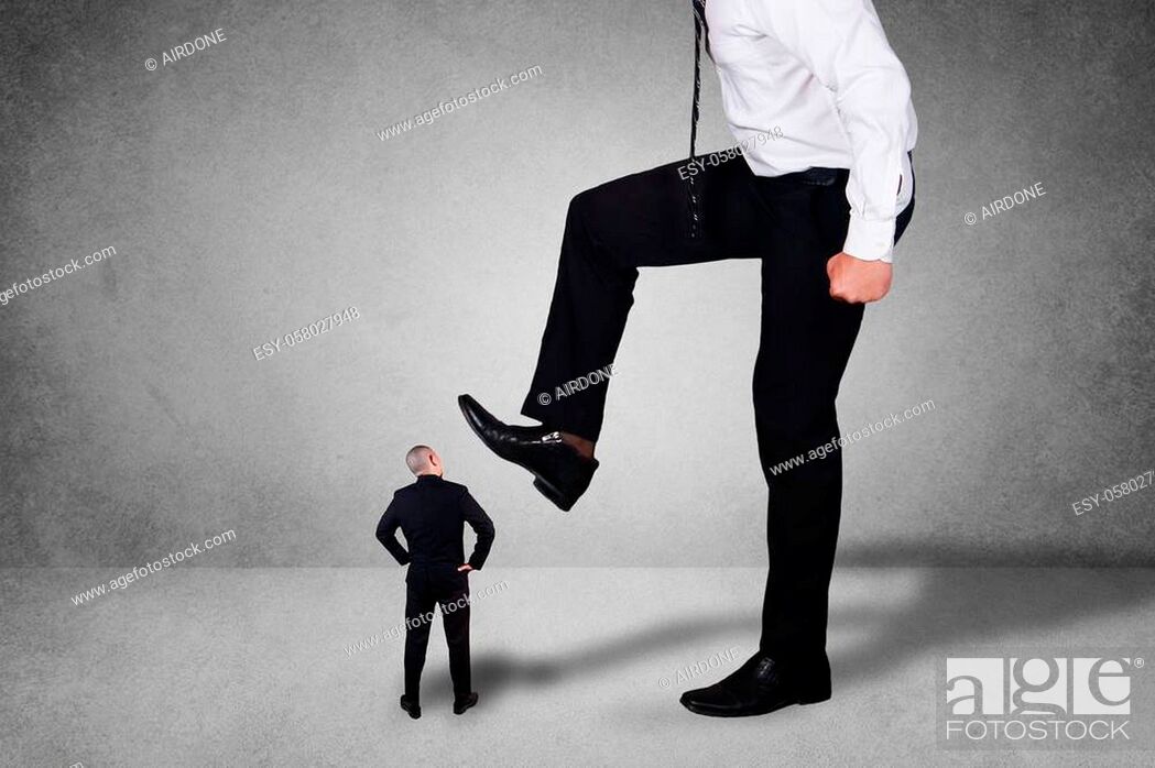 Stock Photo: Composite image, bad leadership conflict concept. Big boss trying to stomping step on his small worker.