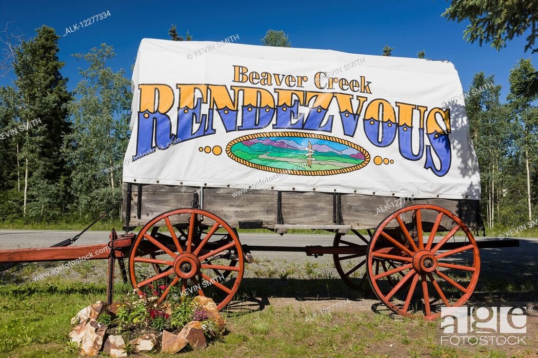 Stock Photo: Beaver Creek Rendezvous sign on a historic wooden wagon, Beaver Creek, Northern Yukon Territory, Canada, Summer.