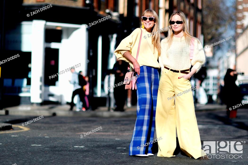 Stock Photo: Jeanette Friis Madsen, Fashion Editor at Costume Magazine Denmark, and Thora Valdimars, Fashion Director at Costume Magazine Denmark, posing outside the J.