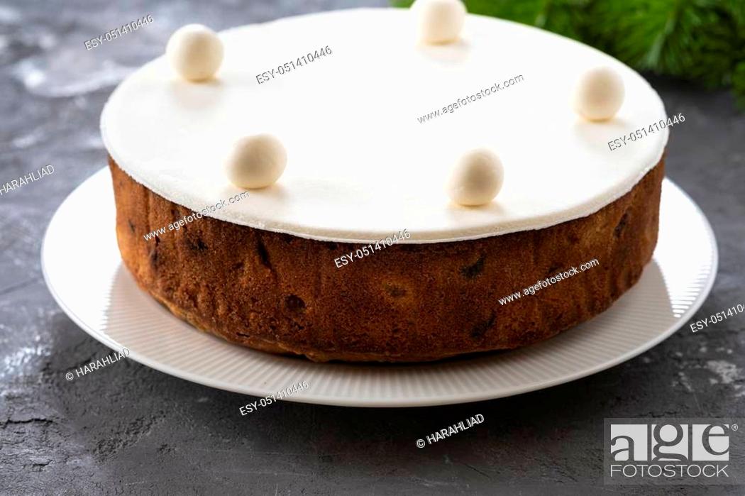 Stock Photo: Christmas fruit cake, pudding on white plate. Christmas concept. Copy space.