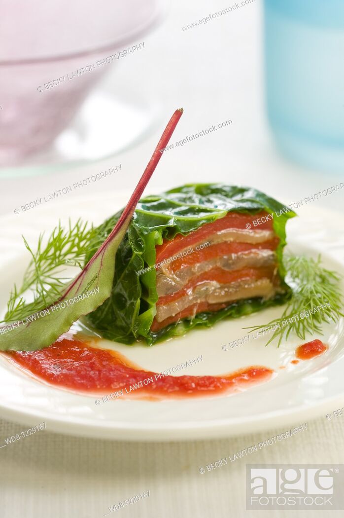 Stock Photo: Platillo de terrina de anchoas y pimientos asados.