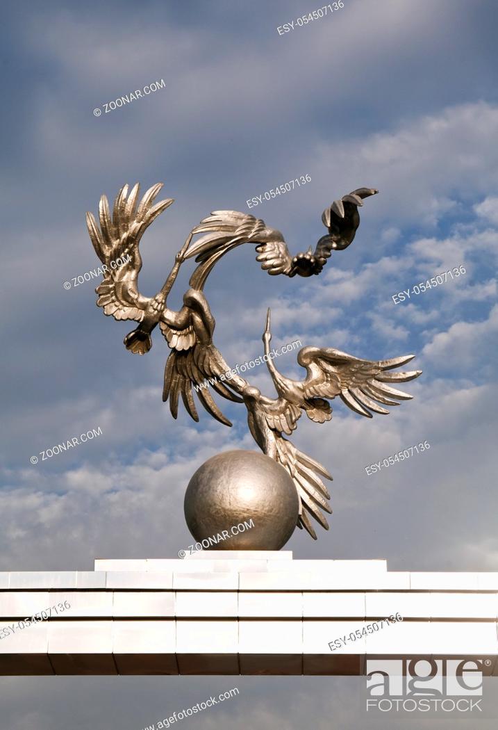 Stock Photo: TASHKENT, UZBEKISTAN - MAY 10, 2014: The storks over the globe on Independence square.