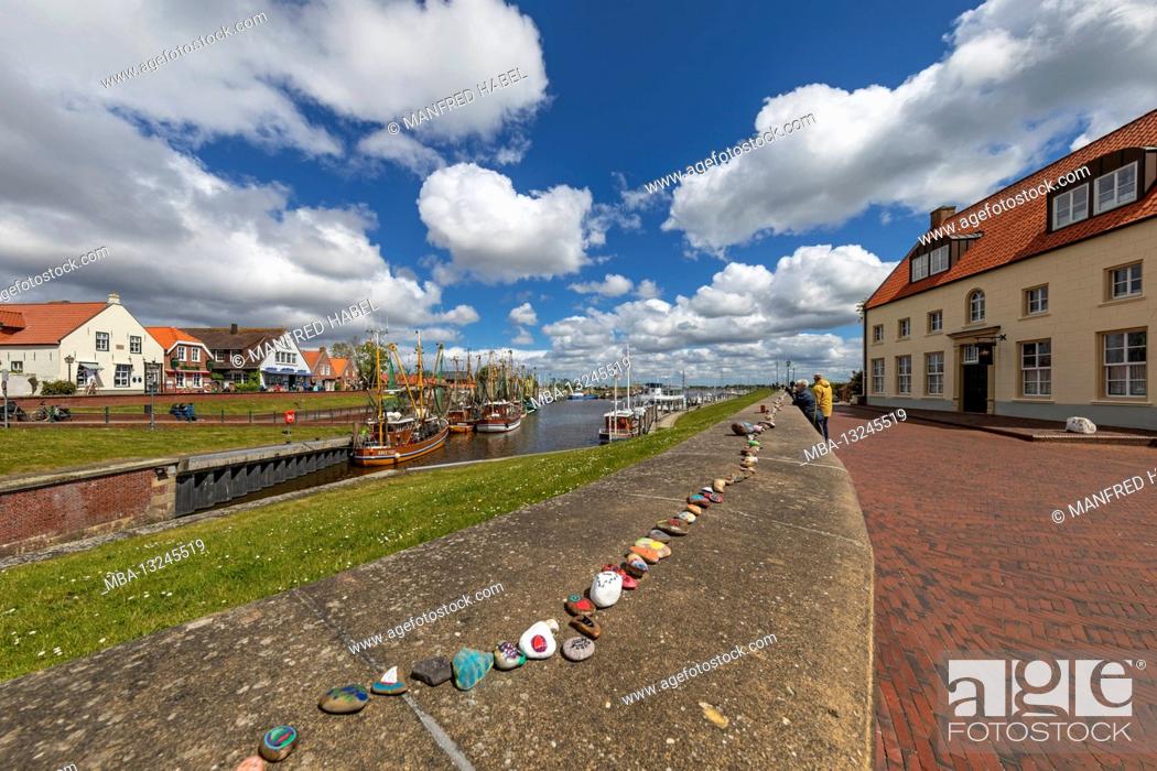 Stock Photo: Harbor wall, crab cutter in the port of Greetsiel, East Frisia, Lower Saxony,.