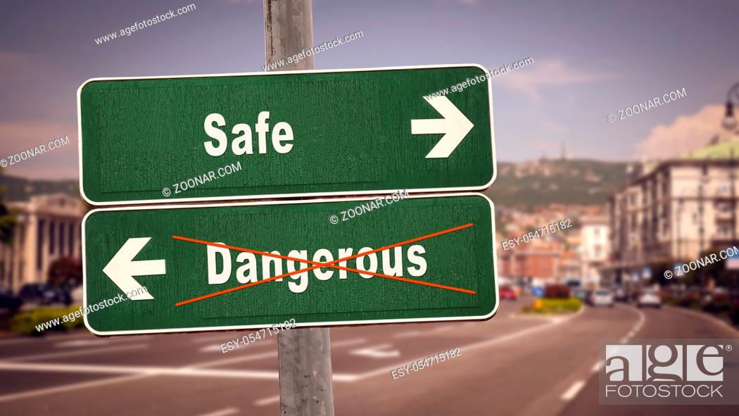 Stock Photo: Street Sign the Direction Way to Safe versus Dangerous.