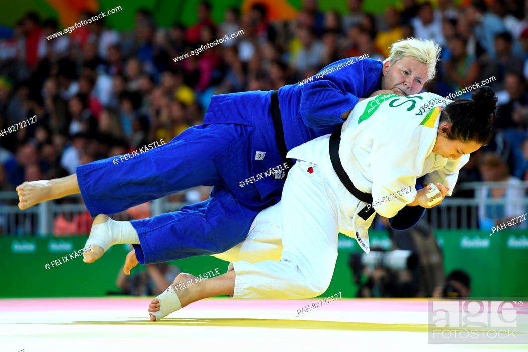 Stock Photo: Jasmin Kuelbs of Germany (blue) in action against Ksenia Chibisova of Russia during the Women +78 kg Elimination Round of 32 of the Judo events during the Rio.