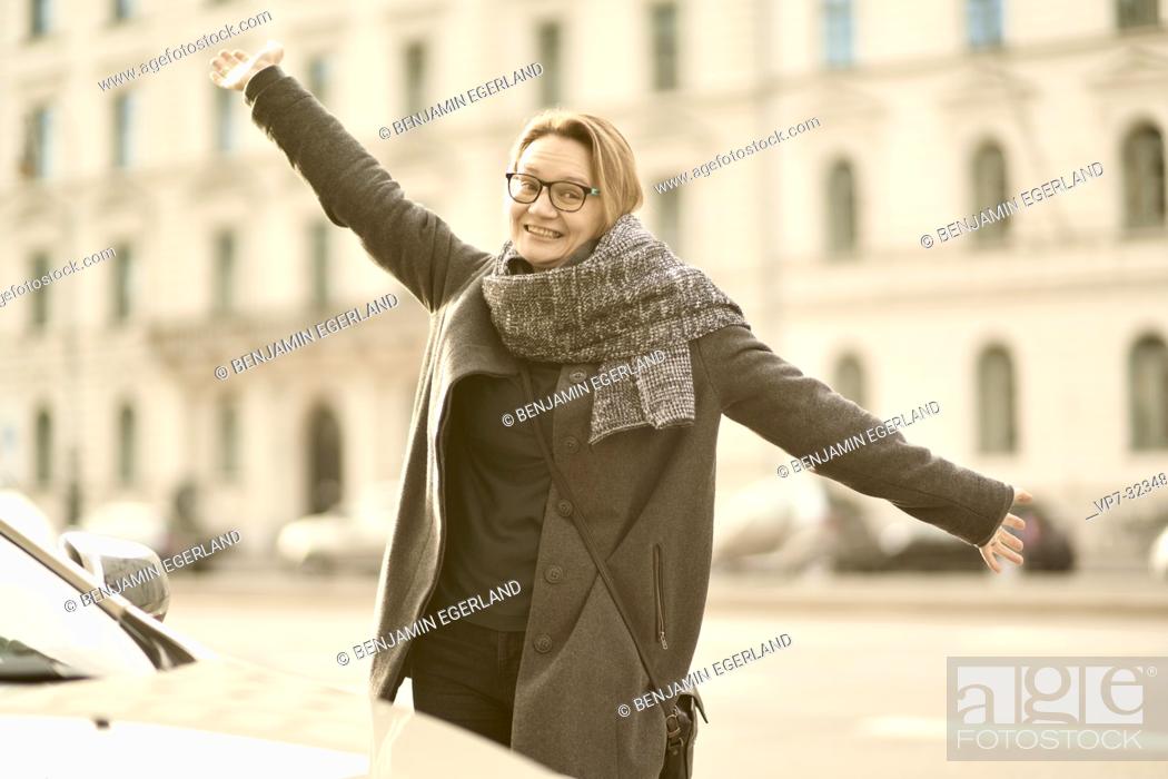 funny woman dancing at street in city Munich, Germany, Stock Photo, Picture  And Rights Managed Image. Pic. VP7-3234855 | agefotostock