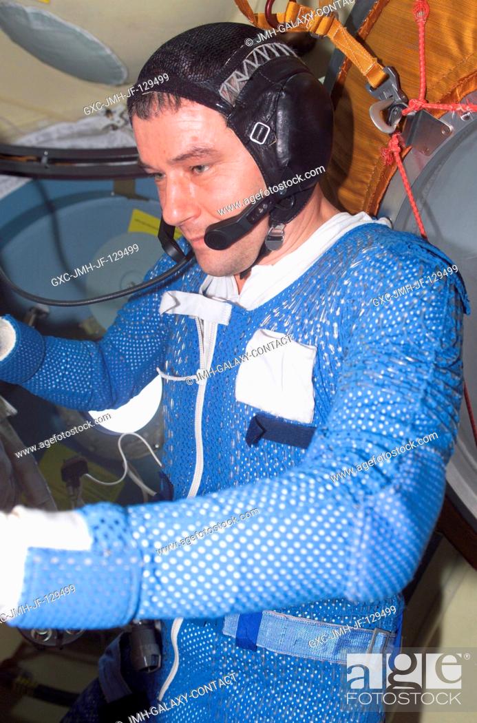 Stock Photo: Cosmonaut Valery G. Korzun, Expedition Five mission commander, attired in his thermal undergarment prior to donning a Russian Orlan spacesuit.