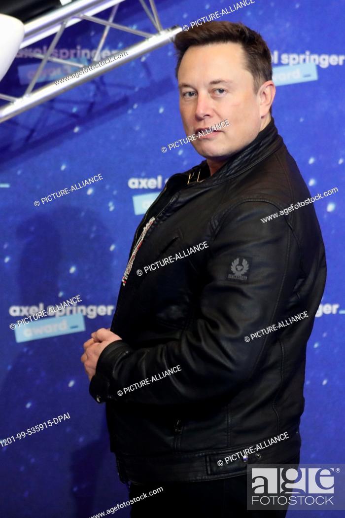Stock Photo: 01 December 2020, Berlin: Elon Musk, head of the space company SpaceX and Tesla CEO, comes to the Axel Springer Award ceremony.