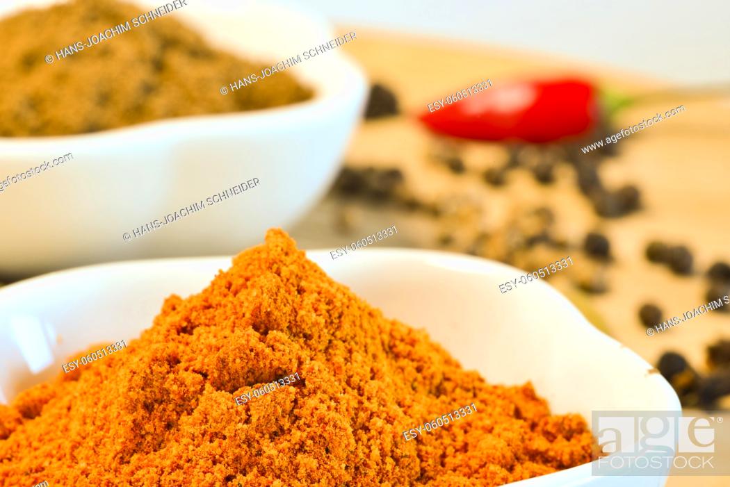 Stock Photo: Arabian spice mix Ras-el-Hanout in a closeup.