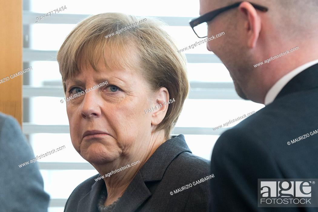 Stock Photo: German chancellor Angela Merkel speaks with CDU Secretary General Peter Tauber at the board meeting of the German Christian Democratic Union (CDU) party in.