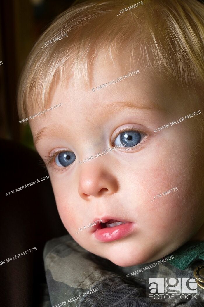 Stock Photo: Young boy with big blue eyes.