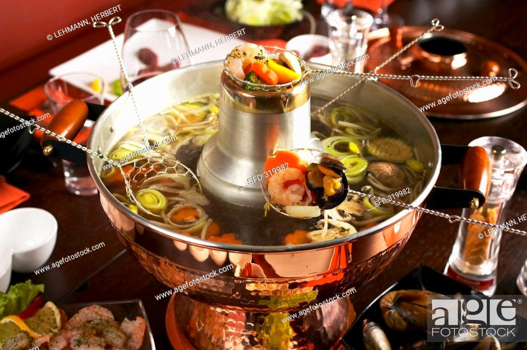Voorkomen Onvermijdelijk Struikelen Chinese fondue Hot pot, Stock Photo, Picture And Rights Managed Image. Pic.  SFD-319982 | agefotostock