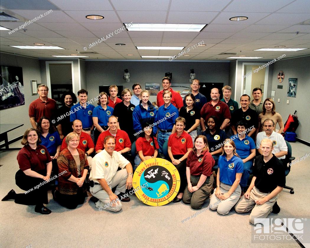 Stock Photo: Before dispatching to their various duty stations, the members of the NEEMO 5 prime crew and its support staff pose for a group portrait.