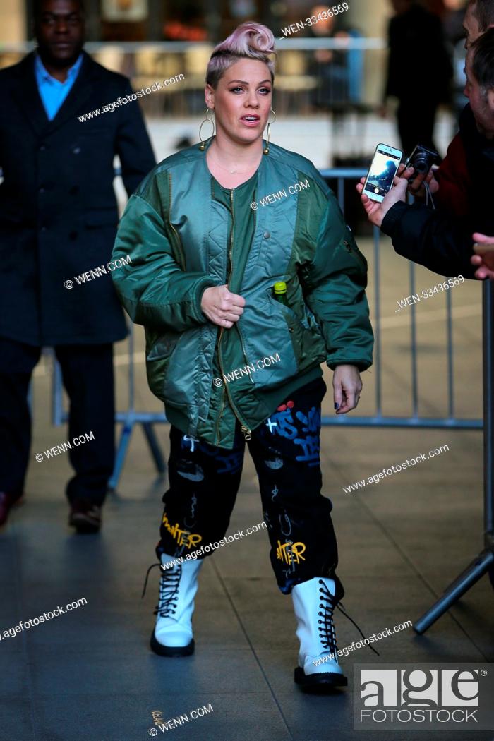 Stock Photo: Singer Pink visiting BBC Radio studios to promote her album 'Beautiful Trauma'. Pink saw a fan who had a massive portrait tattoo of her face and stopped by to.