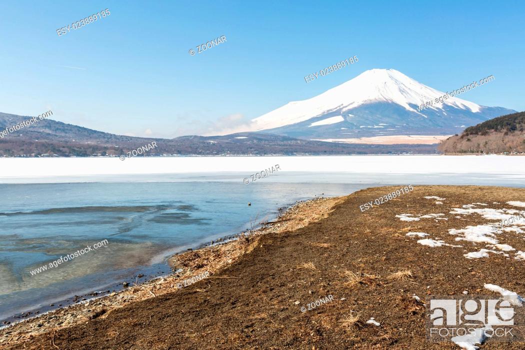 Stock Photo: Mount Fuji Iced Yamanaka Lake.