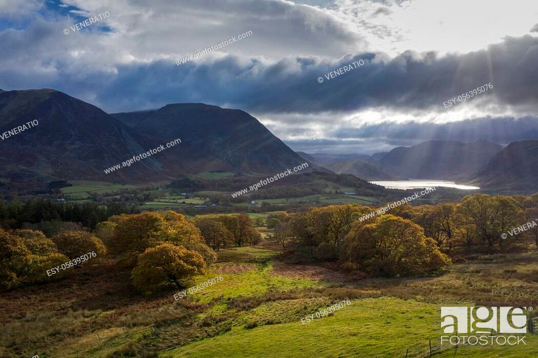 Stock Photo: Stunning aerial drone Autumn Fall landscape image of view from Low Fell in Lake District looking towards Crummock Water and Mellbreak and Grasmoor peaks.