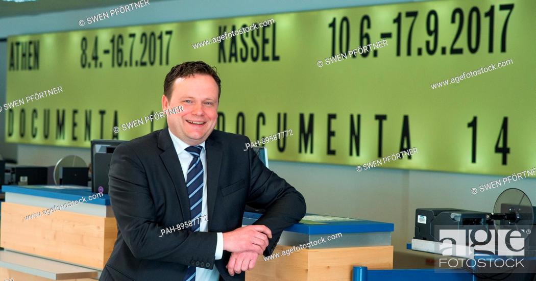 Stock Photo: The new managing director of Kassel Aiport, Lars Ernst, smiles during his introduction in front of a terminal of Kassel Airport in Calden, Germany, 4 April 2017.