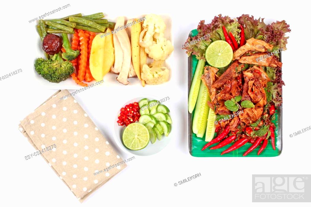 Stock Photo: Spicy and sour mixed herb salad with fried stir taro in tofu sheet and fried mixed vegetables served with side dish are food for Vegetable festival of Chinese.