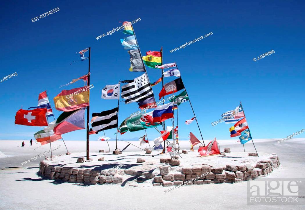 Stock Photo: Flags in a salt desert of Salar de Uyuni, Bolivia.