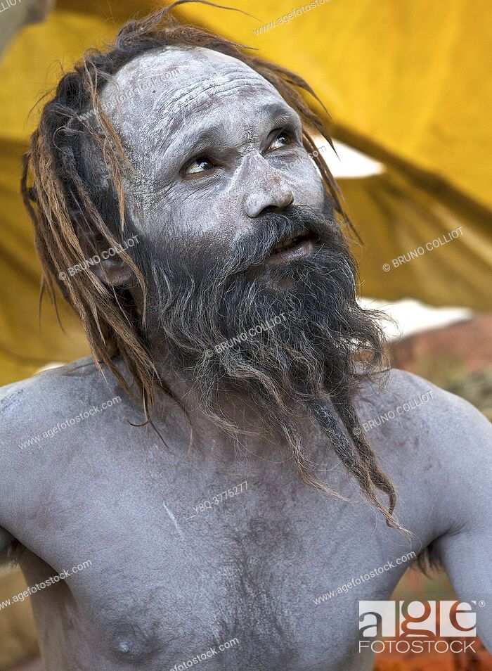 Stock Photo: Naga baba the body coated with the ashes of the sacred fire for a purification on the ghats in benares, awaiting the shivaratri. UP, india.