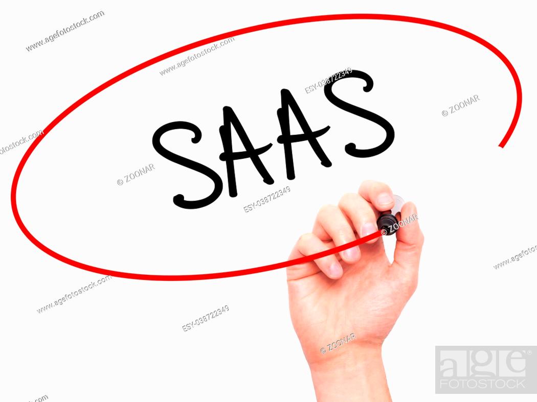 Photo de stock: Man Hand writing SAAS with black marker on visual screen.
