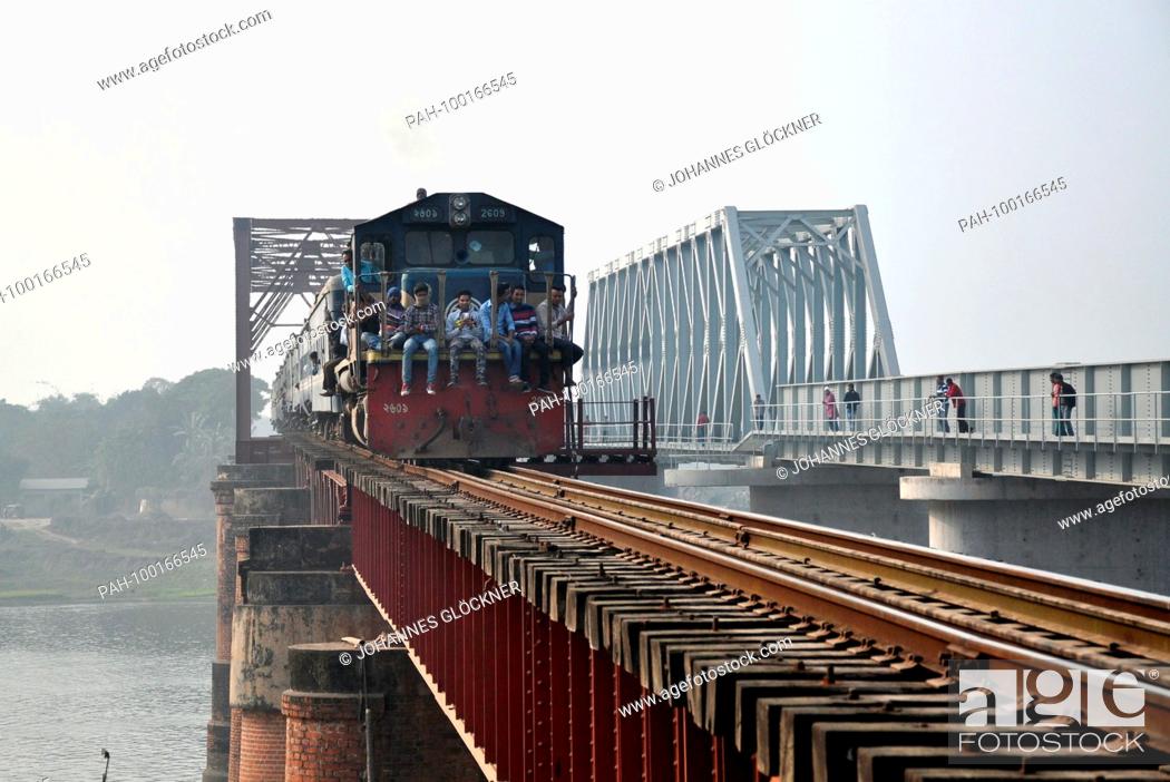 Stock Photo: Old and new railway bridge with train in Ghorashal near Narsingdi on 09.01.2015 - Bangladesh | usage worldwide. - Ghorashal/Dhaka/Bangladesh.