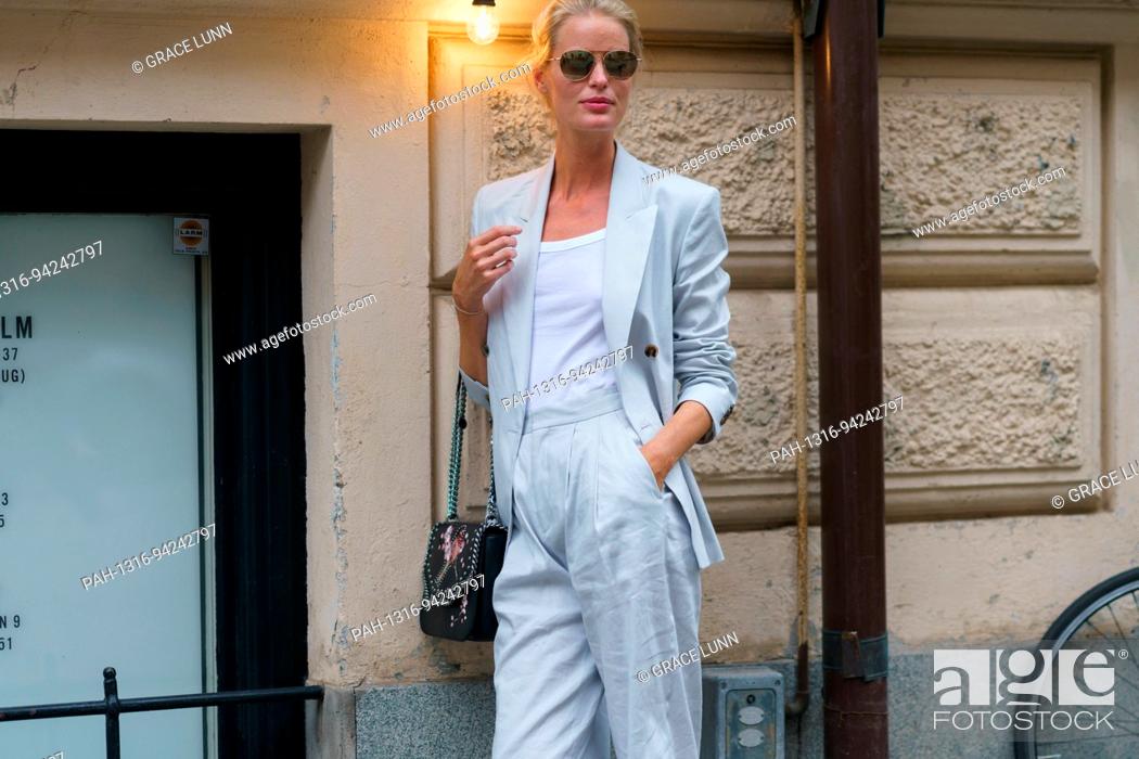 Stock Photo: A chic showgoer posing outside the Totême runway show during Stockholm Fashion Week - Aug 31, 2017 - Photo: Runway Manhattan/Grace Lunn ***For Editorial Use.