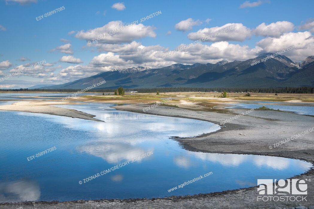 Stock Photo: A panorama of Kicking Horse Reservoir and the Mission Mountains south of Polson, Montana.