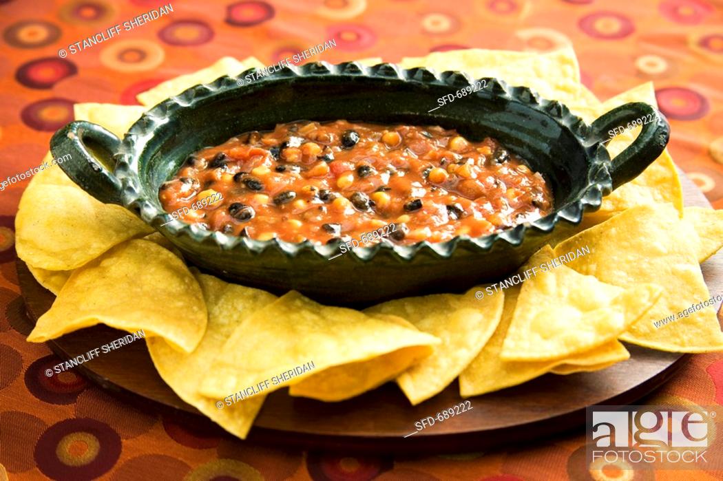 Stock Photo: Black Bean and Corn Salsa with Chips.