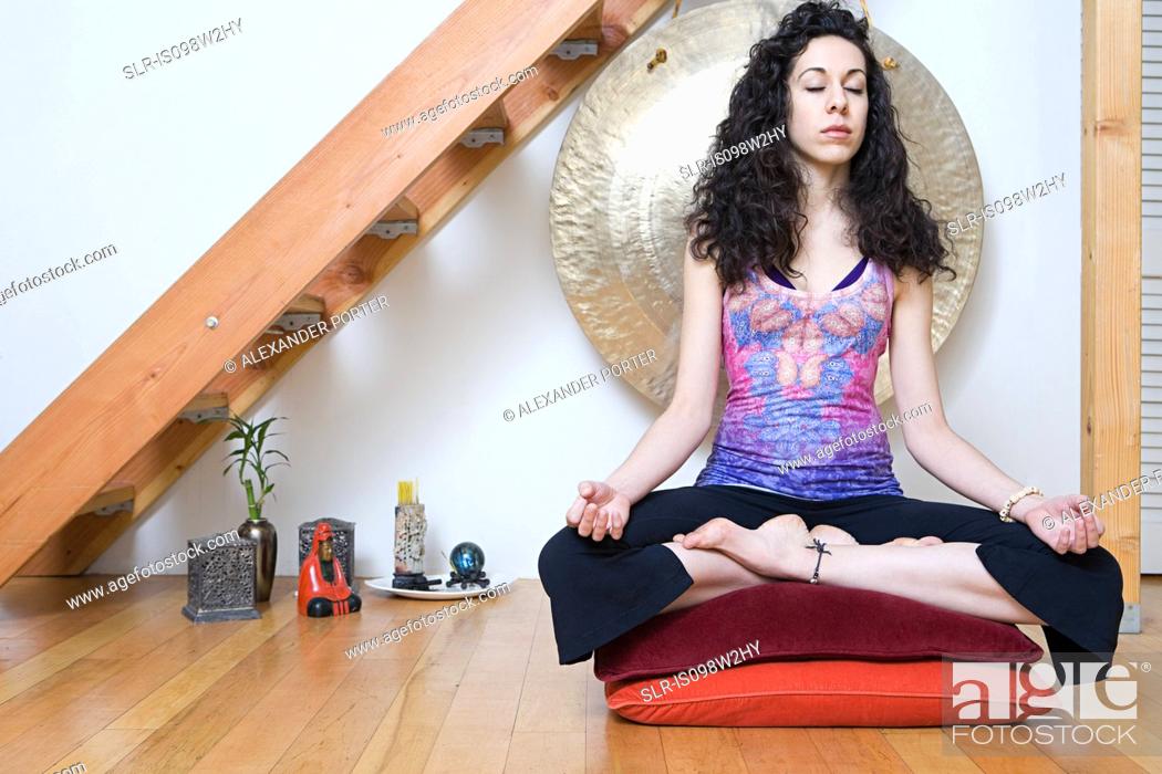 Stock Photo: Women in lotus position during yoga.
