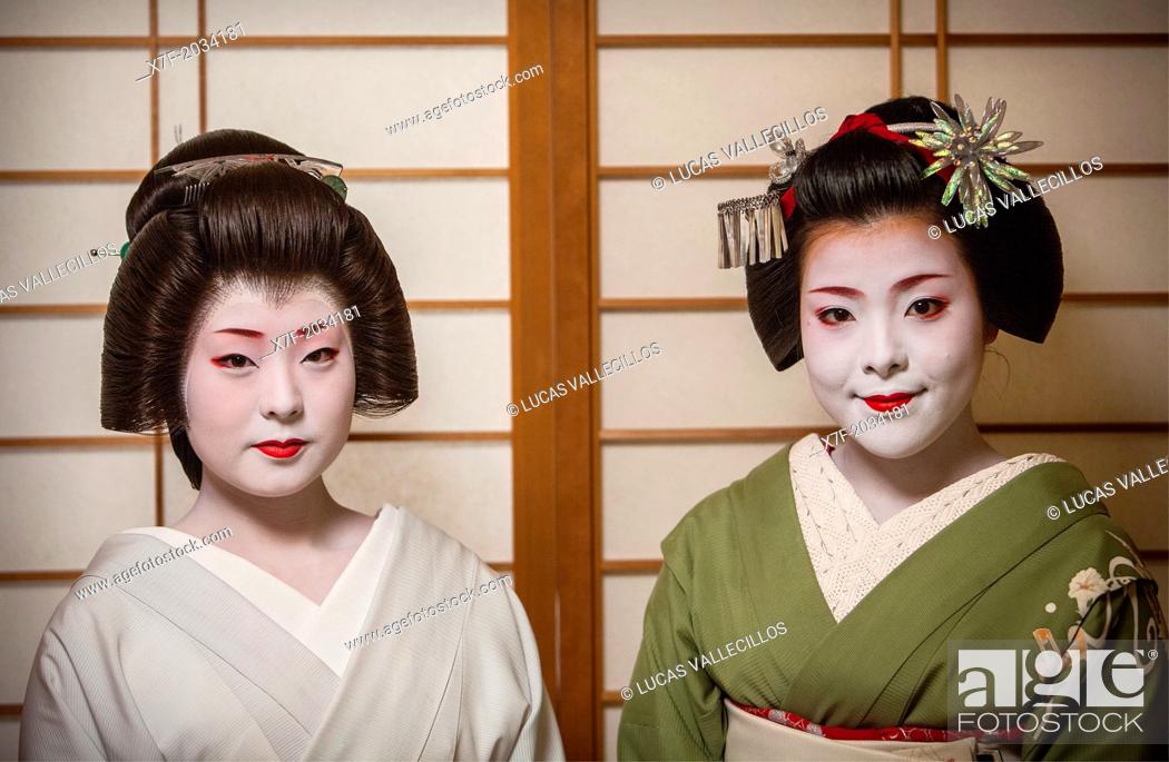 Stock Photo: Fukuyu, geisha and Fukukimi, 'maiko' (geisha apprentice). from Ishihatsu okiya (geisha house).Geisha's distric of Miyagawacho.Kyoto. Kansai, Japan.