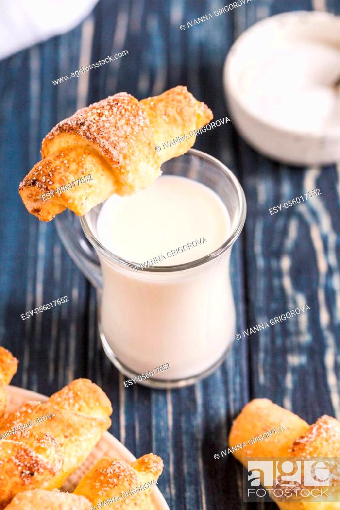 Stock Photo: homemade cottage cheese mini croissants on a blue wooden background. breakfast with croissants.