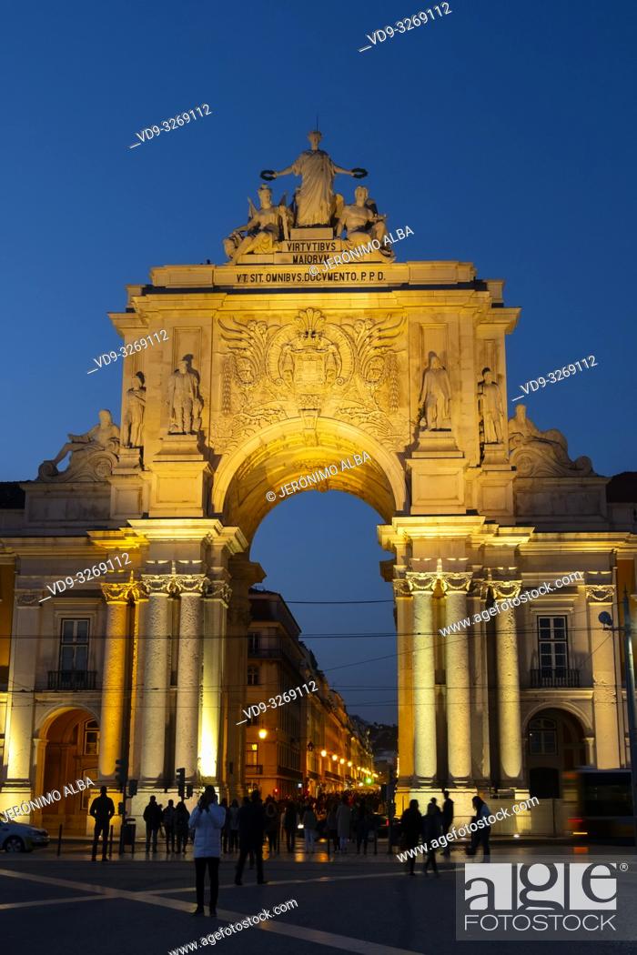 Stock Photo: Triumphal Arch of Rua Augusta at dusk, Commerce Square. Lisbon, Portugal. Europe.