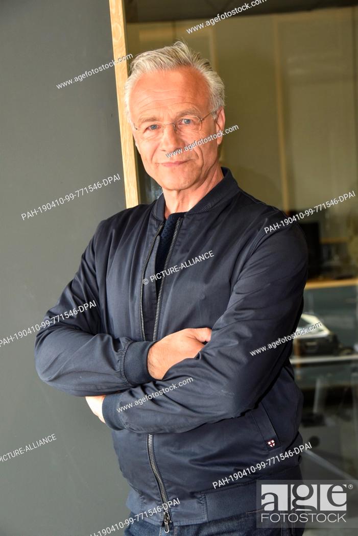Stock Photo: 10 April 2019, North Rhine-Westphalia, Köln: Actor Klaus J. Behrendt as Commissioner Max Ballauf stands in the new commissariat during the shooting of the new.