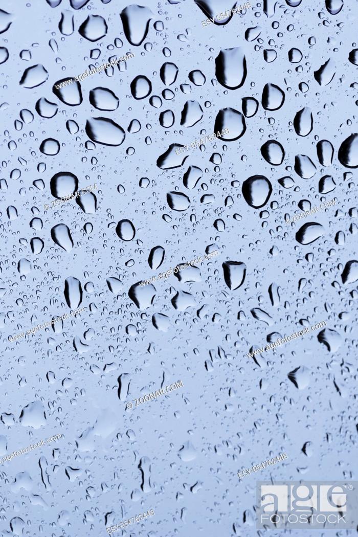 Stock Photo: rain drops on a window glass. Shallow DOF.