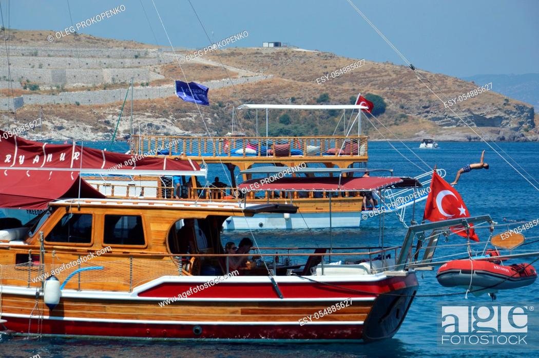Stock Photo: BODRUM, TURKISH - JULY 02, 2020: Yachts parked in marina.