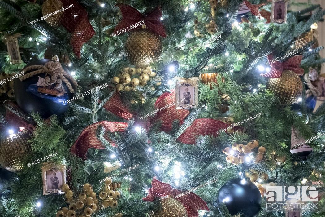 Stock Photo: Depictions of US President John F. Kennedy’s official portrait is featured on ornaments hanging from a tree in The Vermeil Room of the White House during the.