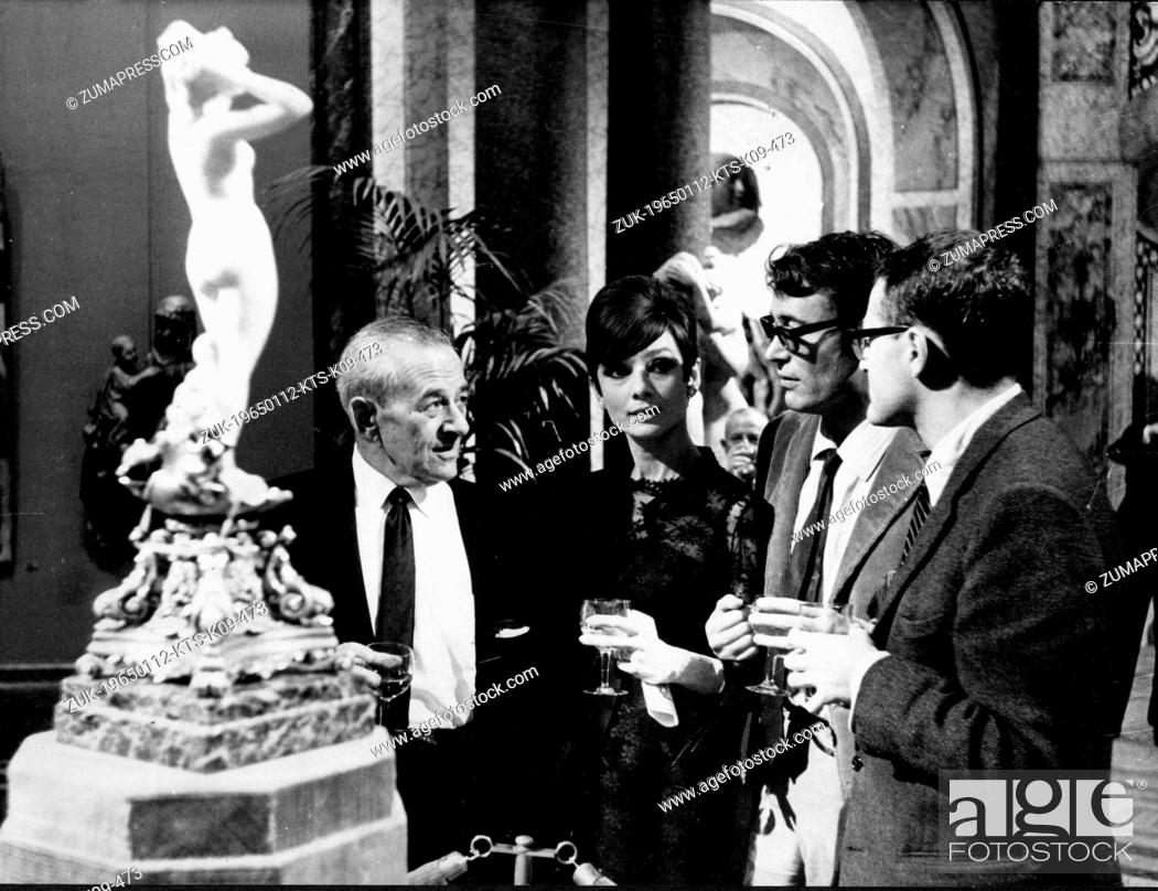 Stock Photo: Jan. 12, 1965 - Paris, France - Irish actor PETER O'TOOLE (b. 8/2/1932), WILLIAM WYLER and AUDREY HEPBURN at a cocktail party held at Boulogne studio in France.