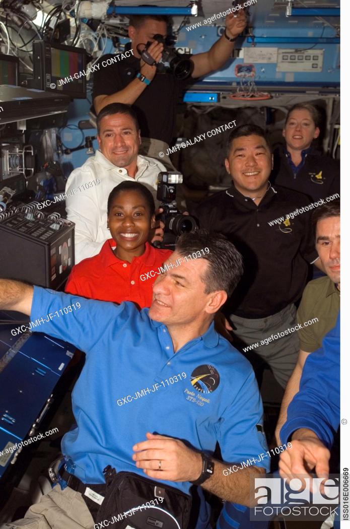 Stock Photo: Expedition 16 and STS-120 crewmembers gather in the Destiny laboratory of the International Space Station shortly after Space Shuttle Discovery docked with the.