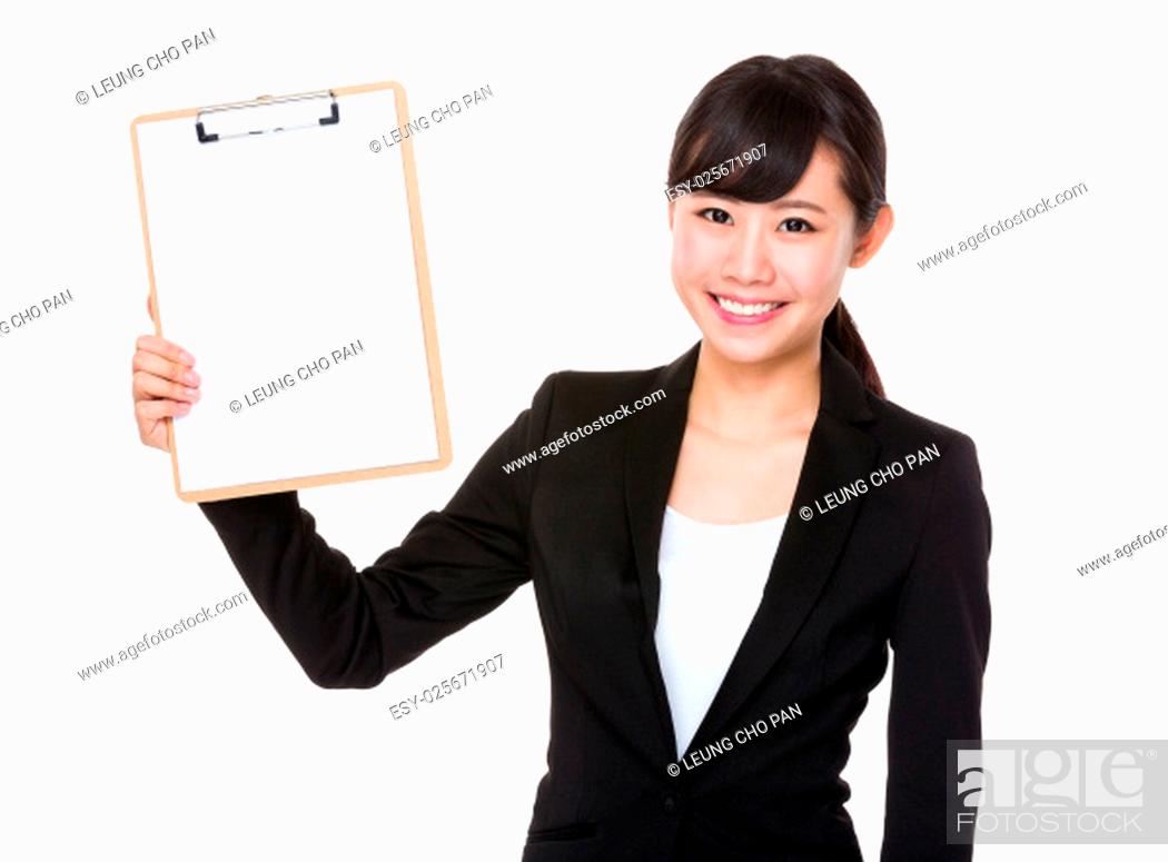 Photo de stock: Asian young Businesswoman show with blank page of clipboard.