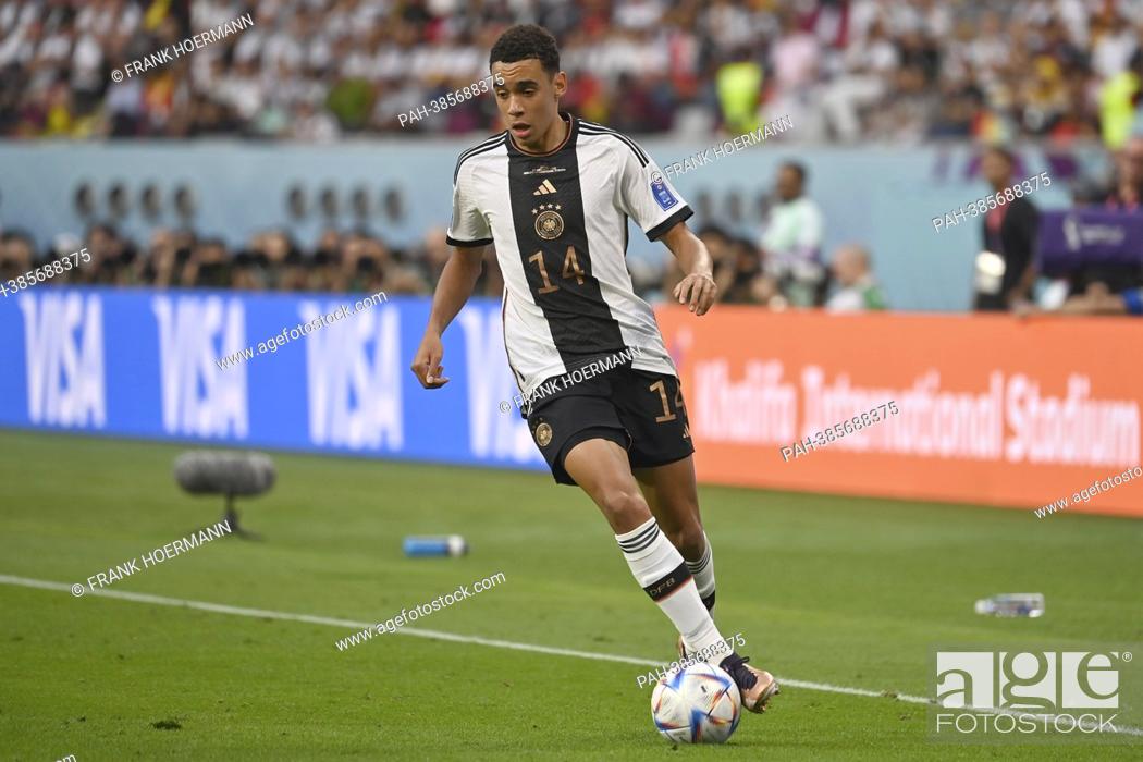Stock Photo: Jamal MUSIALA (GER), action, single action, single image, cut out, full body shot, full figure Germany (GER) - Japan (JPN) 1-2 group stage Group E on November.