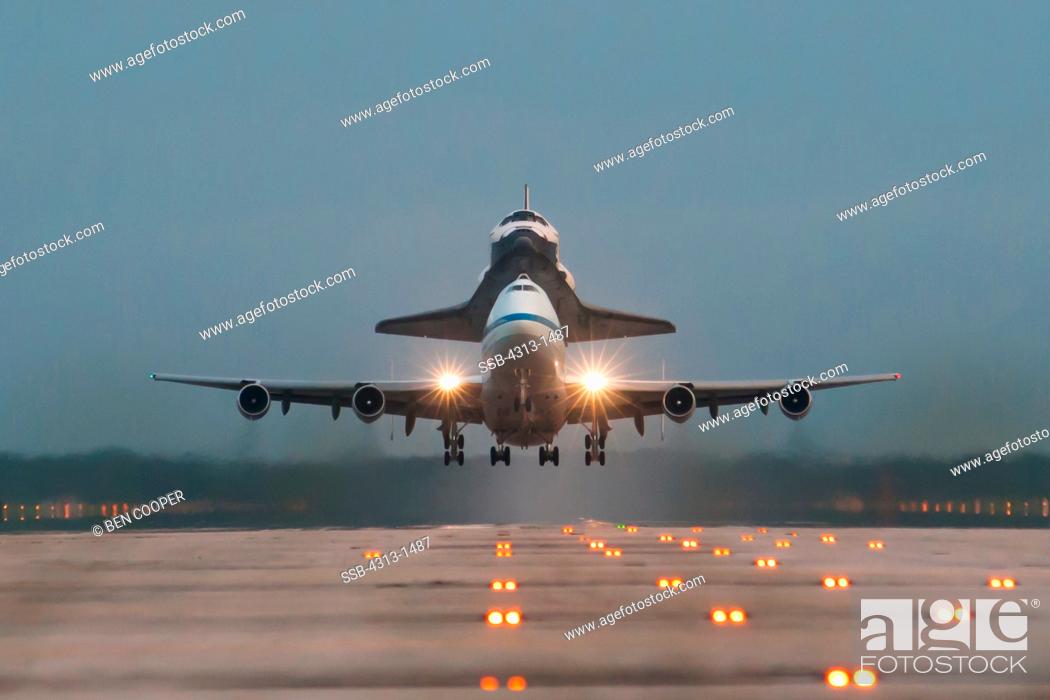 Stock Photo: USA, Florida, Cape canaveral, Kennedy Space Center, Front View of Endeavour space shuttle on top of 747 shuttle carrier aircraft.