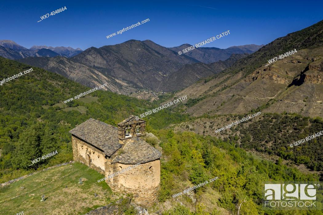 Stock Photo: Aerial view of the church of Santa EulÃ lia and the town of Alendo and the Coma de Burg valley with green fields (Pallars SobirÃ , Lleida, Catalonia, Spain.