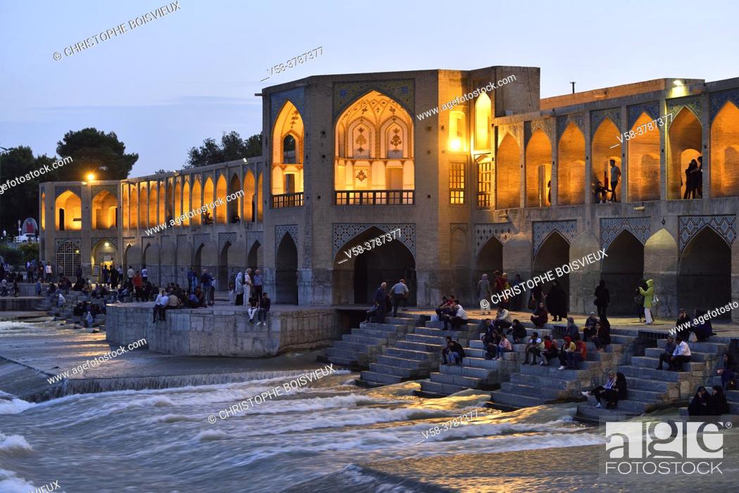 Stock Photo: Iran, Isfahan, World Heritage Site, Khaju bridge and Zayandeh river by night.