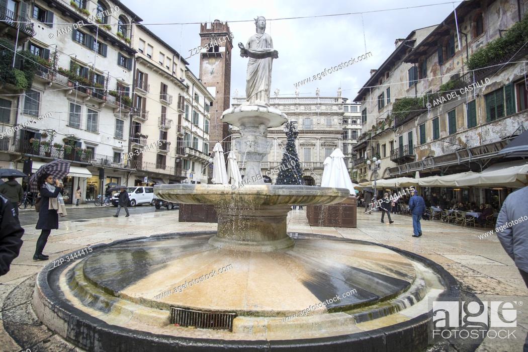 Stock Photo: Verona Veneto Italy on November 24, 2019: Christmas in Verona streets. Roman fountain at Piazza delle Erbe.