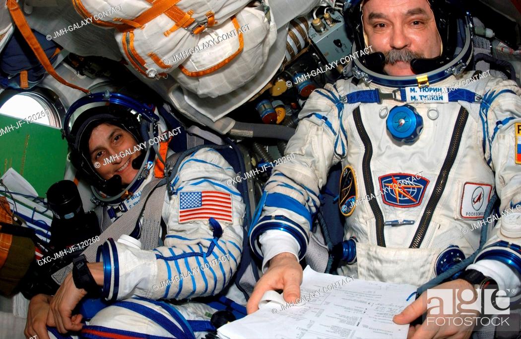 Stock Photo: Astronaut Sunita L. Williams (left), Expedition 14 flight engineer, and cosmonaut Mikhail Tyurin, Soyuz commander and flight engineer.