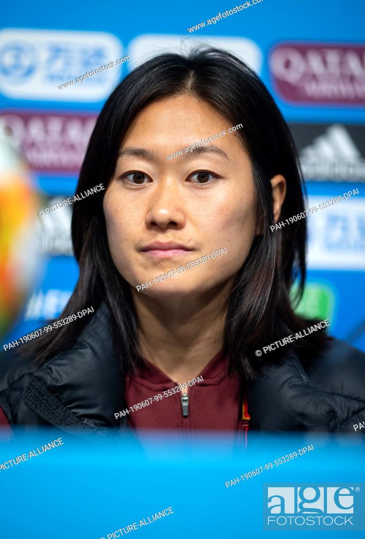 Stock Photo: 07 June 2019, France (France), Rennes: Football, women, World Cup, national team, China, press conference: Captain Haiyan Wu takes part in a press conference.