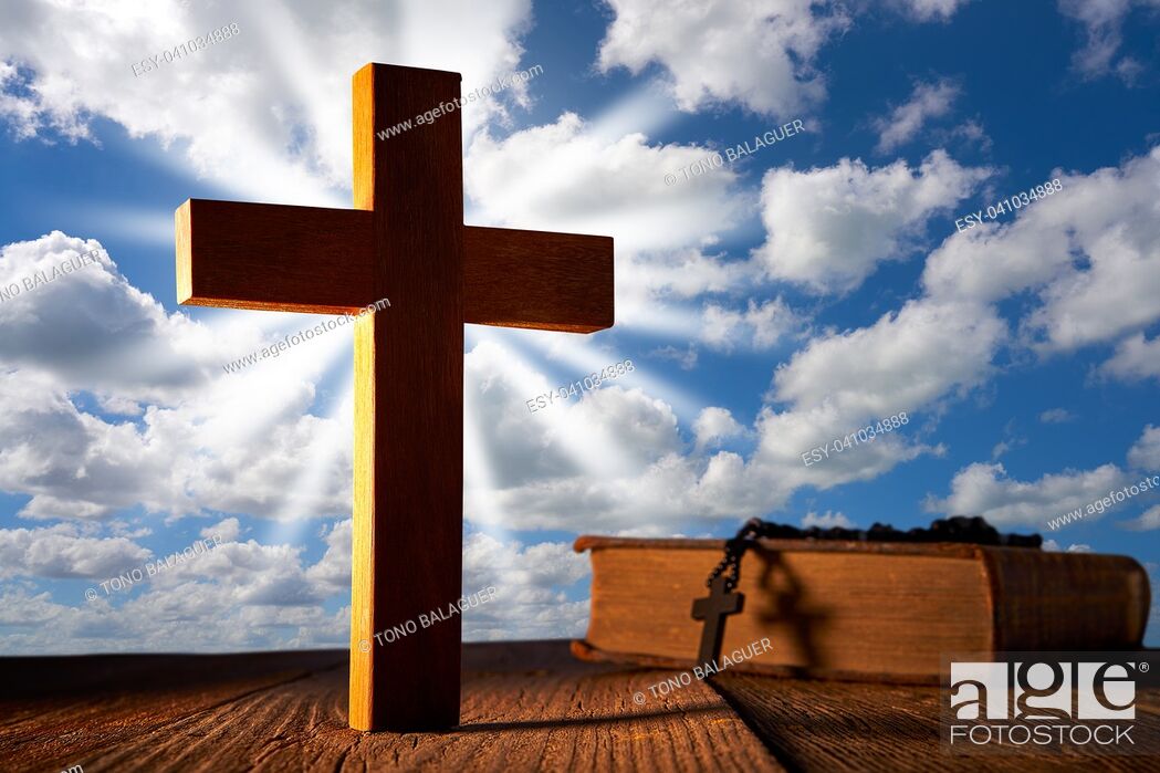 Stock Photo: Christian wood cross on blue sky wooden made with Bible and rosary beads.